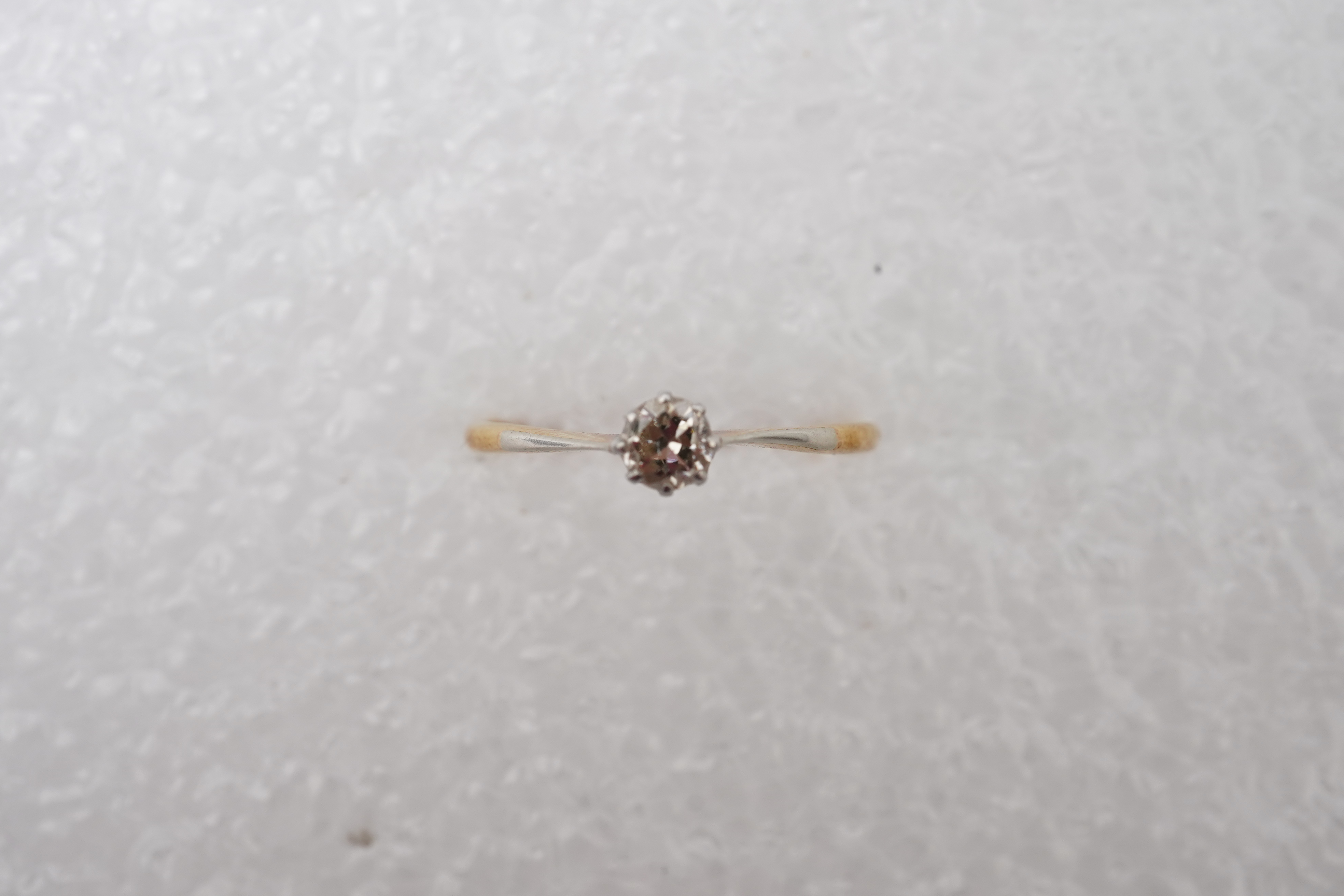 A small solitaire diamond ring, early 20th century